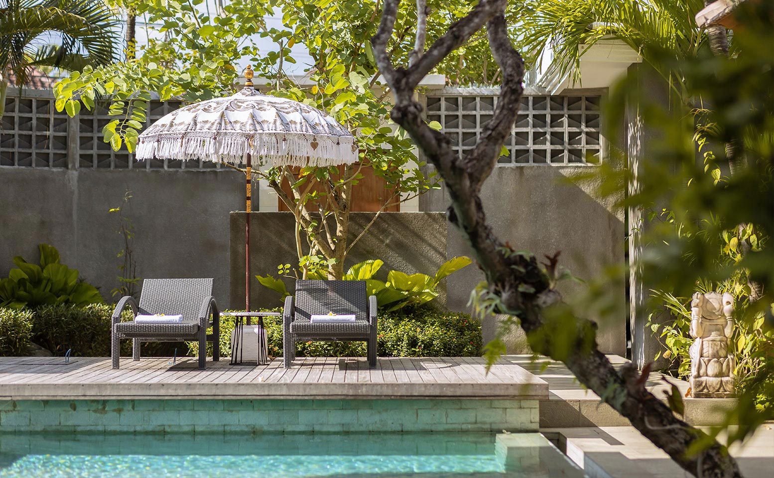 Villa Christie - sunbed with traditional Bali umbrella