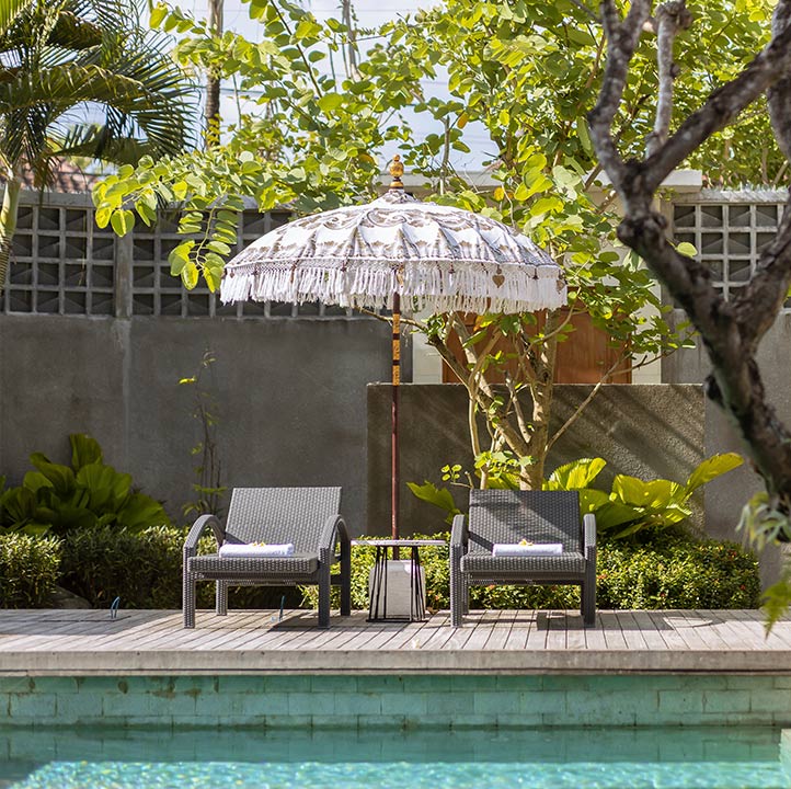 Villa Christie - sun lounger with bali traditional umbrella